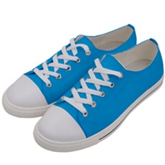 A Blue Sky With A Plane Flying In The Sky Women s Low Top Canvas Sneakers by catchydesignhill