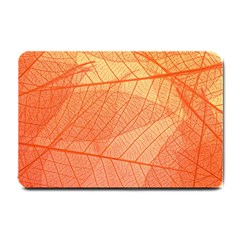 Abstract Texture Of Colorful Bright Pattern Of Transparent Leaves Of Orange And Yellow Color Small Doormat by Posterlux